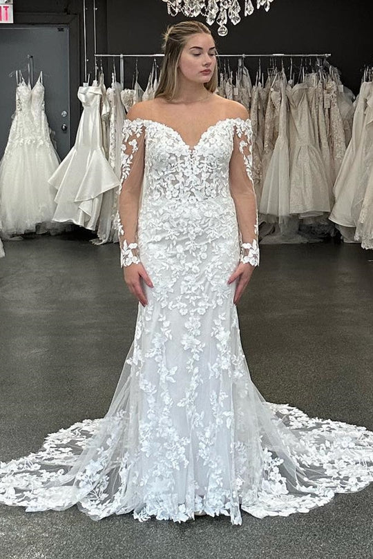 Robe de mariée à manches dénudées et appliqués